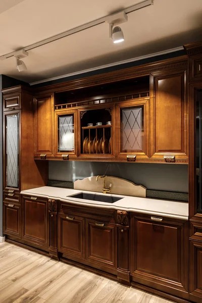 Interior of modern kitchen with wooden cabinets — Stock Photo