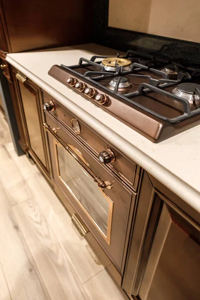 Renovated kitchen interior with stove on counter — Stock Photo