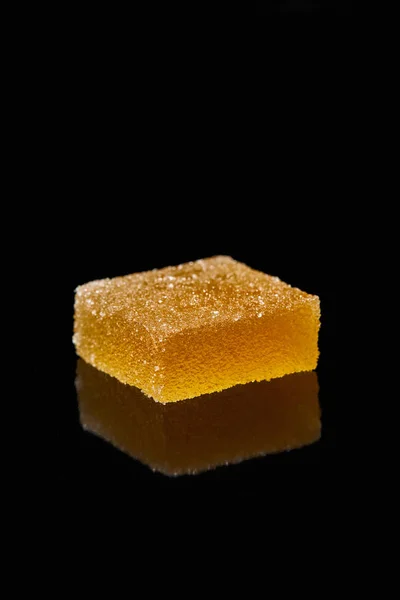 Closeup view of jelly candy on black background — Stock Photo