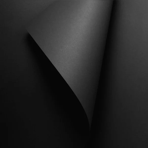 Hoja de papel oscuro y fondo abstracto negro - foto de stock