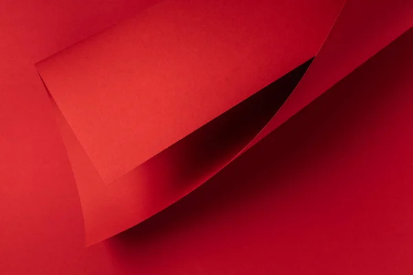 Vue rapprochée du fond de papier abstrait rouge vif — Photo de stock