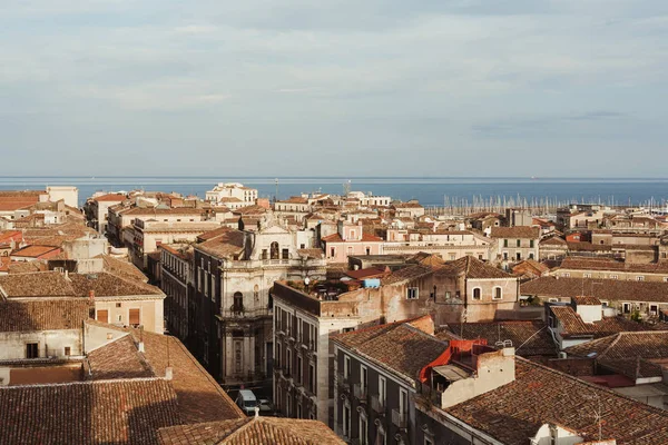 Sunshine on buildings against blue sky in catania — Stock Photo