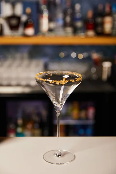 Margarita glass with brown sugar on white bar counter — Stock Photo