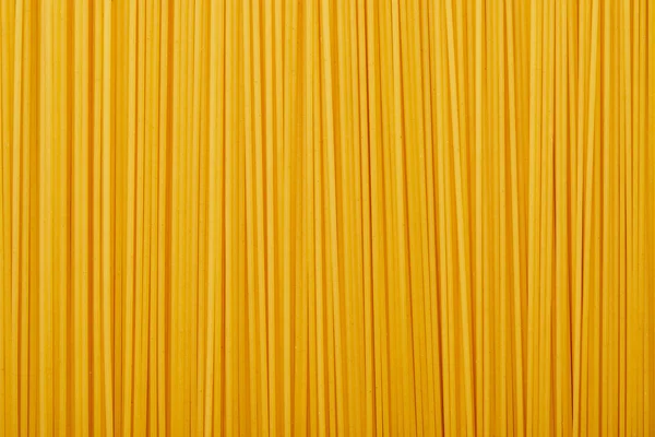 Vista superior do padrão de fundo sem costura espaguete cru — Fotografia de Stock