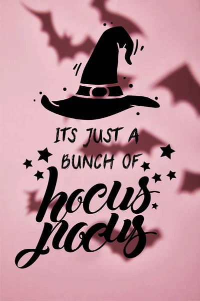 Shadow of flying bats on pink background with its just a bunch of hocus pocus illustration — Stock Photo