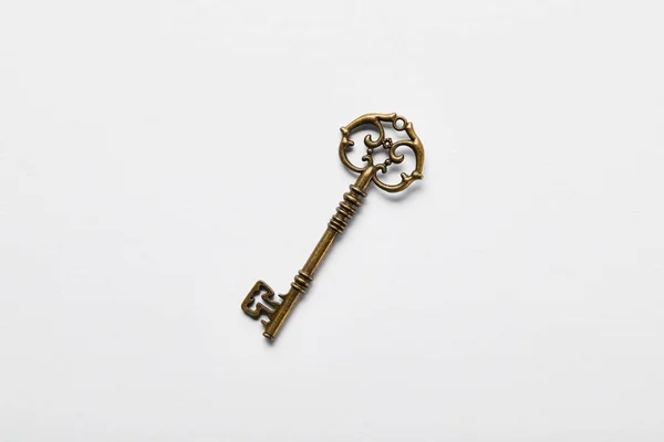 Top view of vintage key on white background — Stock Photo