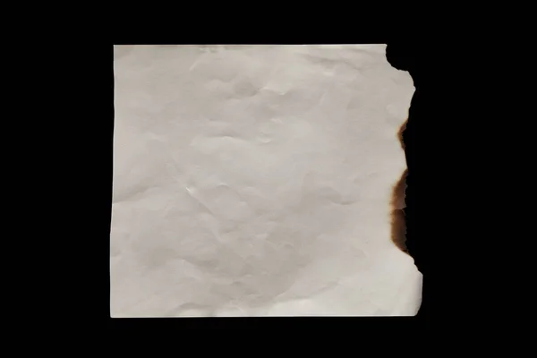Draufsicht auf leeres verbranntes Altpapier isoliert auf Schwarz — Stockfoto
