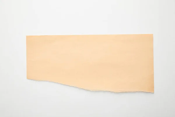 Top view of empty orange paper on white background — Stock Photo