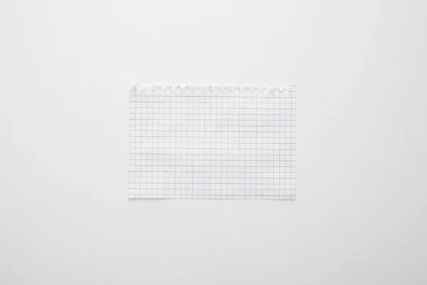 Vista superior de papel vazio isolado em branco — Fotografia de Stock