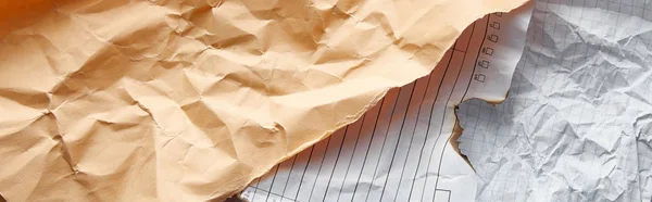 Top view of empty crumpled and burnt vintage papers, panoramic shot — Stock Photo