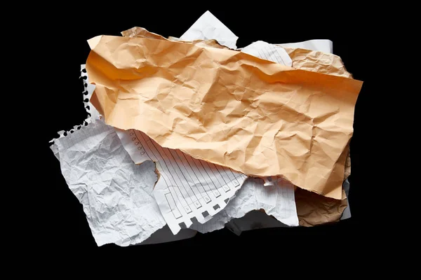 Top view of empty crumpled papers isolated on black — Stock Photo