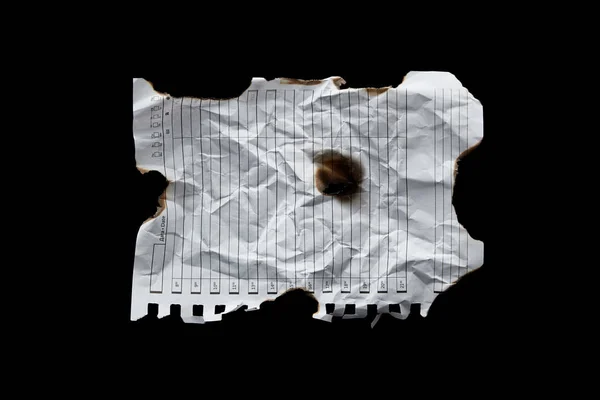 Top view of empty white crumpled and burnt vintage paper isolated on black — Stock Photo