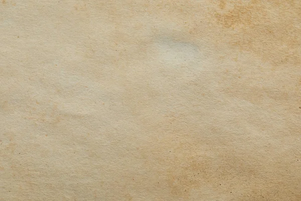 Вид сверху на текстуру старинной бежевой бумаги — стоковое фото