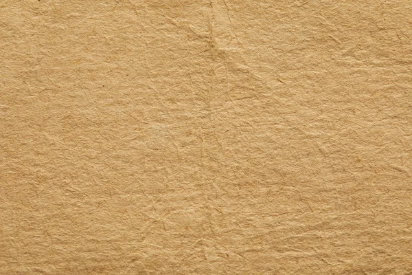 Вид сверху на текстуру старинной бежевой бумаги — стоковое фото
