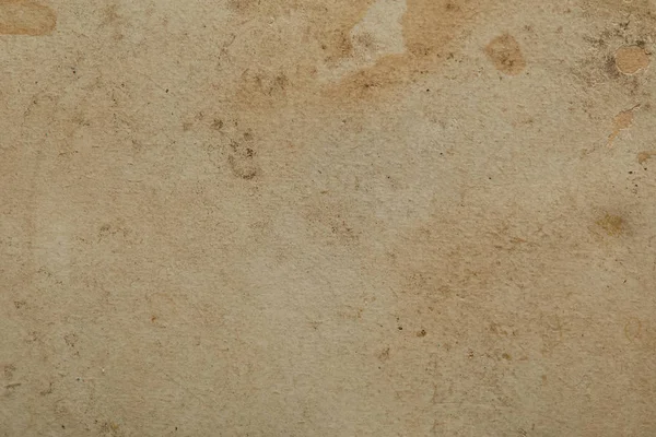 Vue du dessus de la texture vintage en papier beige sale avec espace de copie — Photo de stock