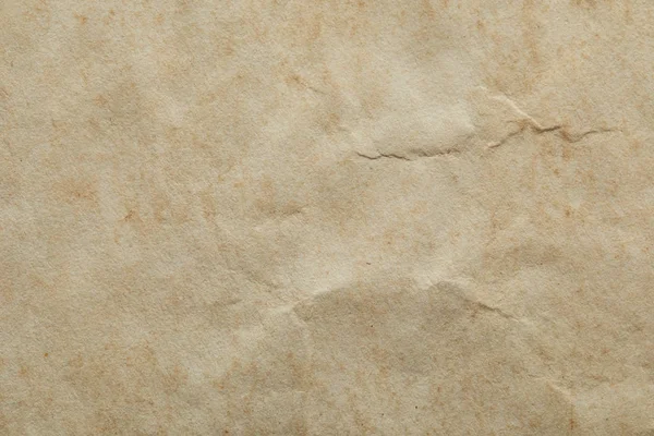 Vue du dessus de la texture de papier vintage beige froissé avec espace de copie — Photo de stock