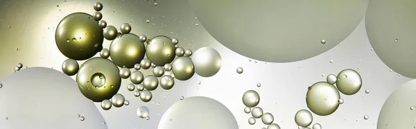 Plano panorámico de fondo abstracto creativo de agua mezclada y aceite en color verde claro y gris — Stock Photo