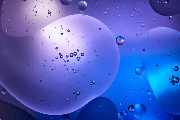 Creative abstract blue and purple color background from mixed water and oil — Stock Photo