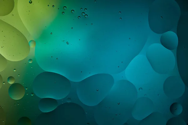 Abstract turquoise color background from mixed water and oil — Stock Photo