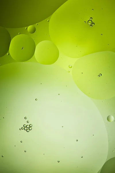 Beautiful green color abstract background from mixed water and oil — Stock Photo