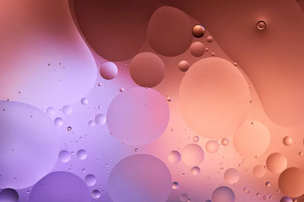 Creative abstract purple and pink color texture from mixed water and oil bubbles — Stock Photo