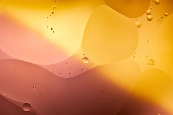 Beau fond abstrait de mélange d'eau et d'huile de couleur orange et rose — Photo de stock