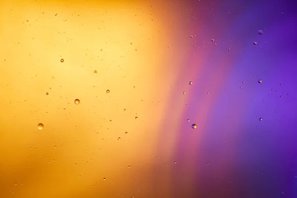 Astratto sfondo di colore arancione e viola da acqua mista e olio — Foto stock