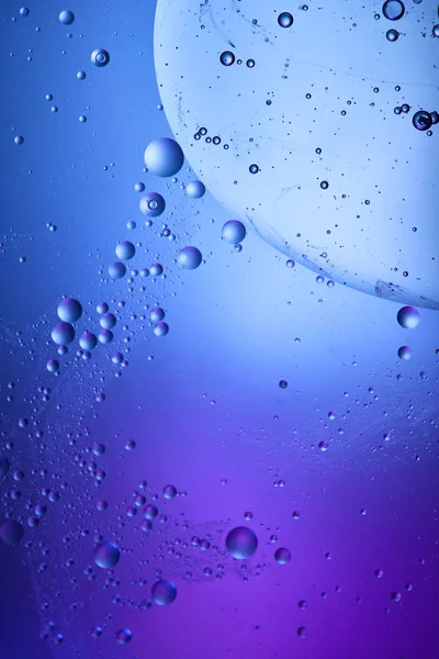 Creative abstract blue and purple color background from mixed water and oil — Stock Photo
