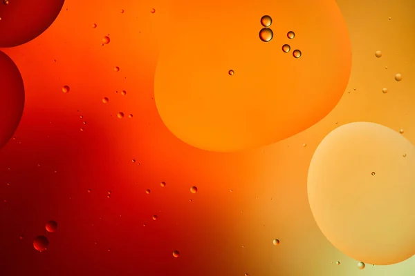 Beautiful abstract orange and red color background from mixed water and oil — Stock Photo