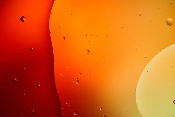 Orange and red color abstract background from mixed water and oil — Stock Photo