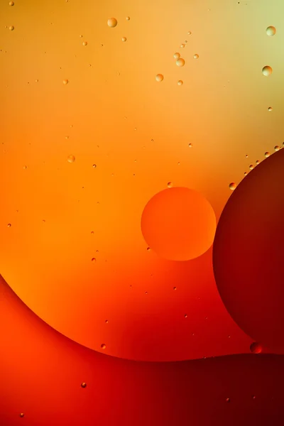 Orange and red color abstract background from mixed water and oil — Stock Photo