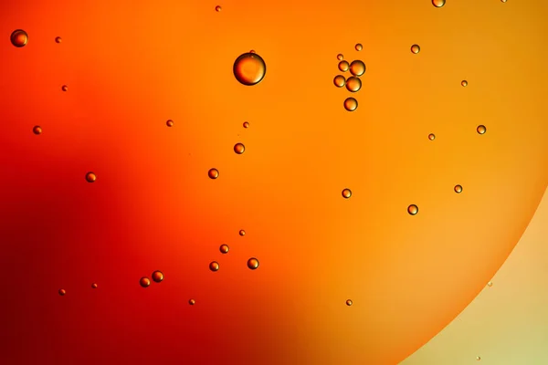 Abstrato laranja e vermelho cor de fundo de água e óleo misturados — Fotografia de Stock