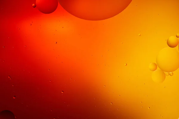 Creative abstract orange and red color background from mixed water and oil — Stock Photo