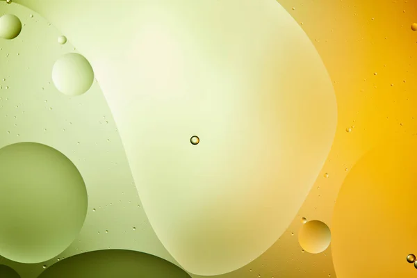 Fundo abstrato de água mista e óleo na cor verde e laranja — Fotografia de Stock
