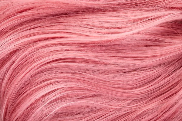 Vue rapprochée des cheveux roses colorés — Photo de stock