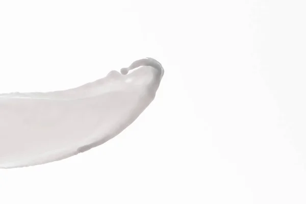 Salpicadura de leche blanca fresca pura aislada en blanco - foto de stock