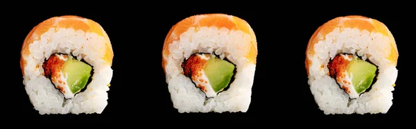 Delicioso sushi de Filadélfia fresco com abacate, queijo cremoso, caviar de salmão e masago isolado em preto, tiro panorâmico — Fotografia de Stock