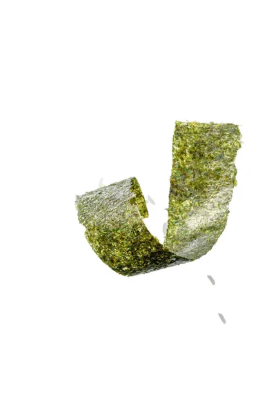 Top view of twisted nori seaweed piece and rice isolated on white — Stock Photo