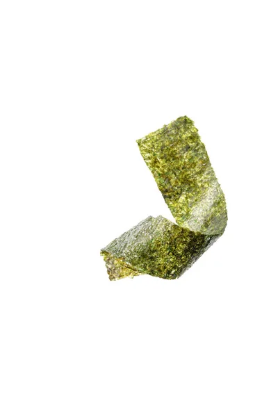 Top view of twisted nori seaweed piece isolated on white — Stock Photo