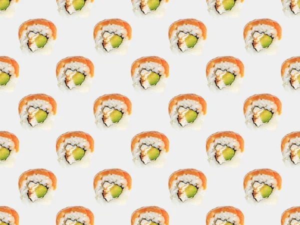 Seamless pattern of delicious Philadelphia sushi with salmon isolated on white — Stock Photo