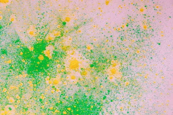 Amarillo y verde colorido holi pintura explosión — Stock Photo