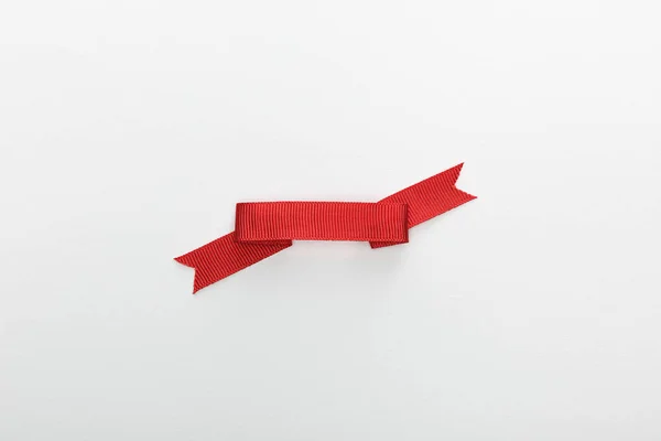 Top view of red decorative ribbon isolated on white — Stock Photo