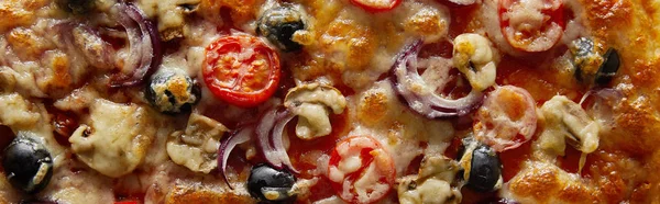 Top view of delicious pizza with cherry tomatoes, olives and parmesan, panoramic shot — Stock Photo