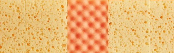 Panoramic shot of yellow and orange sponges for house cleaning — Stock Photo