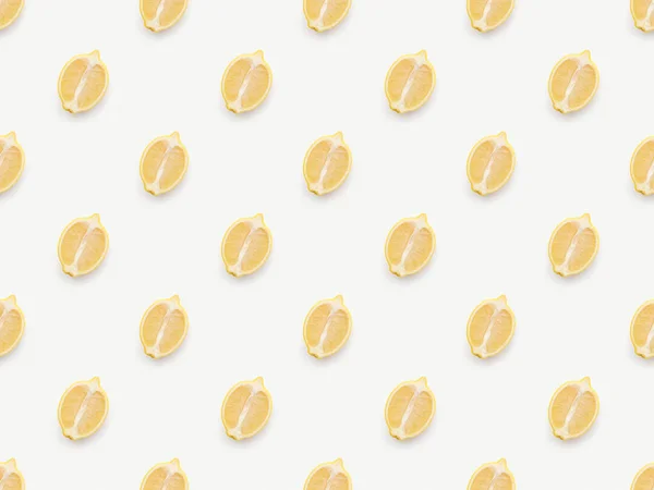 Top view of lemons halves on white background — Stock Photo