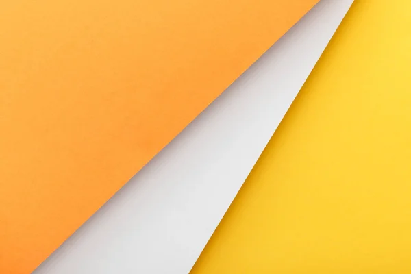 Top view of yellow, orange and white background — Stock Photo