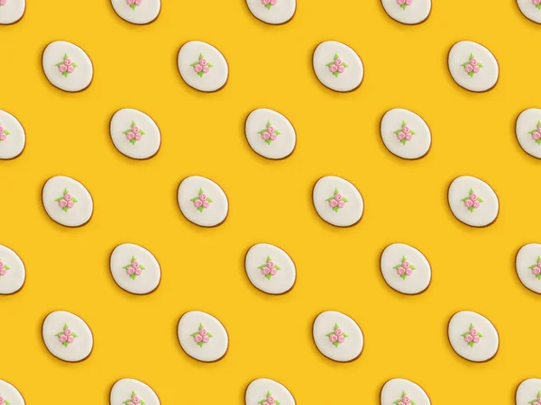 Vista superior de las galletas de Pascua aisladas sobre fondo amarillo, patrón sin costuras - foto de stock