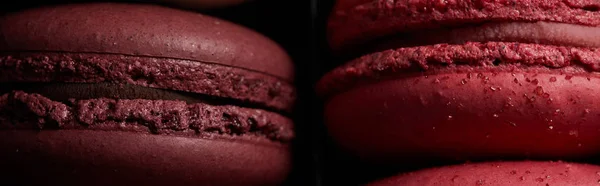 Close up view of red assorted delicious colorful french macaroons, panoramic shot — Stock Photo