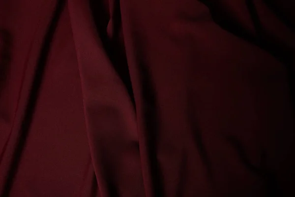 Dark burgundy soft and crumpled textured cloth — Stock Photo