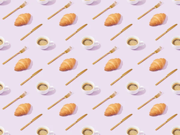 Golden forks and knives, croissants and coffee on violet, seamless background pattern — Stock Photo